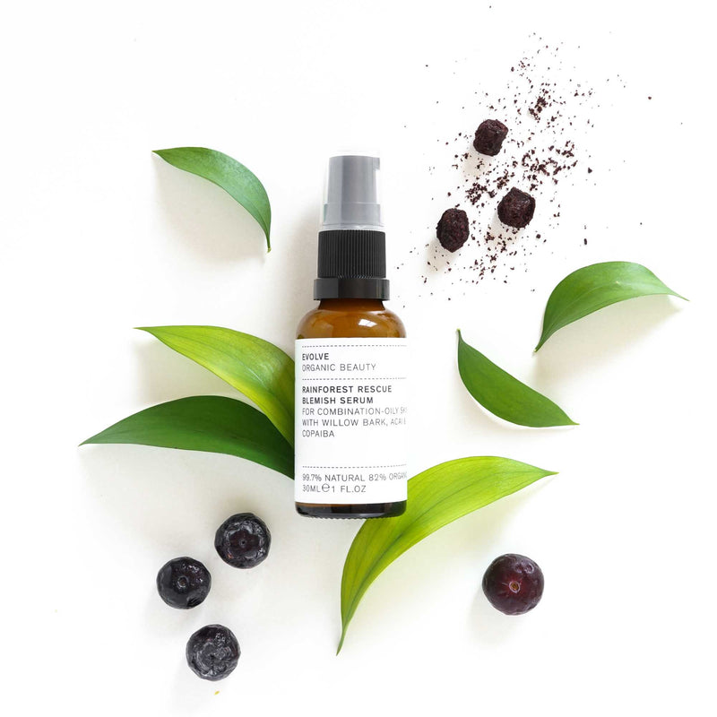 Rainforest Rescue Serum Bottle with berries and leaves 