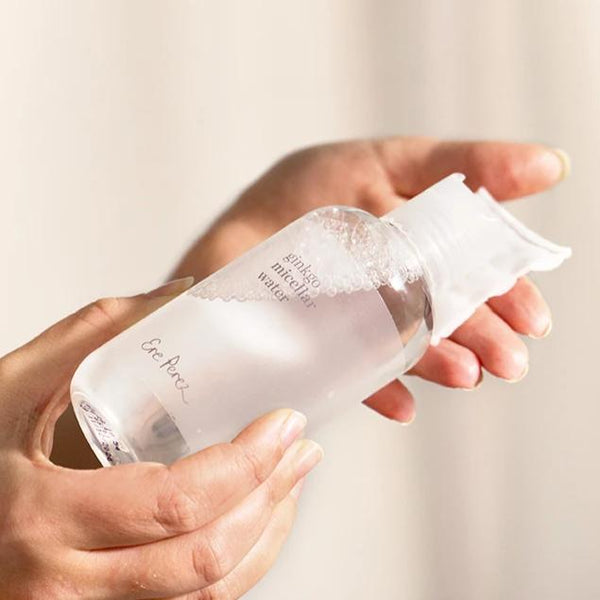 Bottle of Ere Perez Gingko Micellar Water being poured onto a pad